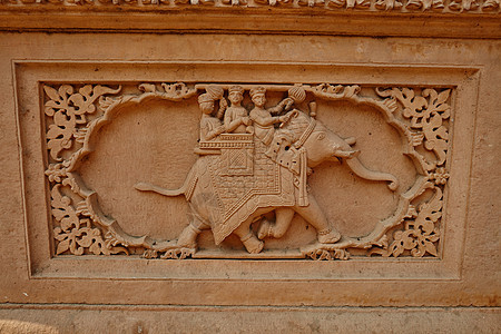 印度寺庙橙色沙石墙装饰品动物旅游石头雕塑砂岩艺术宗教文化骑士建筑图片