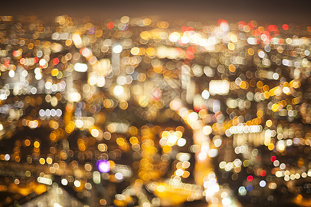 城市的灯光失去焦点城市生活高架背景夜生活柔焦视图运动高角度路灯图片