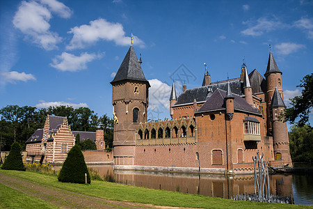 Heeswijk 位于荷兰河边的城堡旅游蓝色游客建筑学文化历史建筑纪念碑池塘天空图片