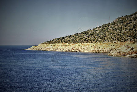 土耳其地中海沿岸的落岩岛 土耳其岩石冲浪旅行假期阳光山脉天堂支撑太阳射线图片