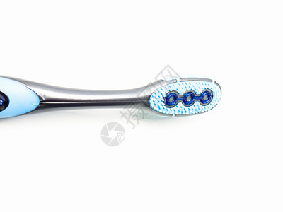 白色背景的蓝色塑料牙刷玻璃刷子牙科打扫擦洗预防化妆品牙膏工具乐器背景图片