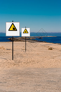 黄黄警示信号警告旅行孤独夫妻海景蓝色码头注意力风险危险图片