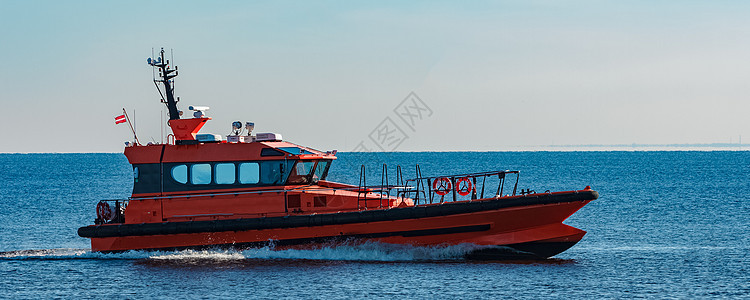 橙色领航船船运发动机领导速度帮助服务力量汽艇海岸线运输图片