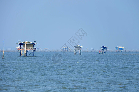 泰国Phetchaburi省湾风景日落太阳渔夫海洋钓鱼天空阳光小屋天气农场图片