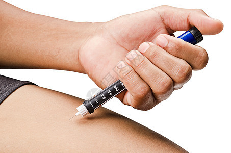 男人用注射的手注射胰岛素笔或注射器图片