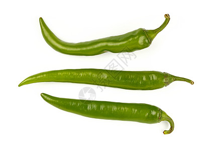 绿色新青辣椒 紧贴白色食物香料烹饪蔬菜图片