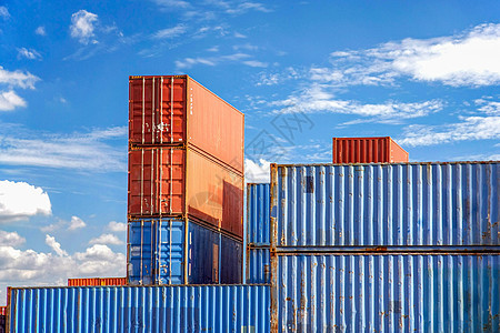 集装箱码头货物进口港口联运橙子商品盒子天空商业图片