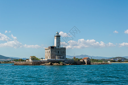 美丽的灯塔蓝色航海导航岩石海岸线海岸建筑学天空旅行海景图片