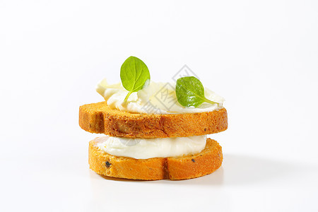 含奶油奶酪的面包面包饼干面包片小吃美味点心草本植物食物图片