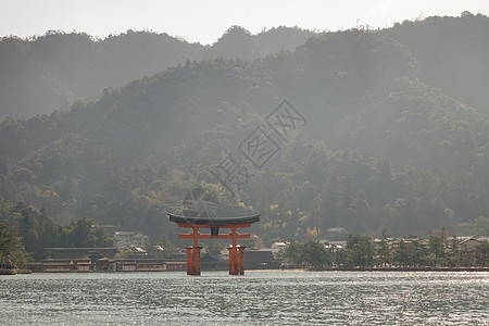 日本水岛神社的漂浮大门建筑学宗教遗产海岸宫岛吸引力佛教徒橙子世界入口图片