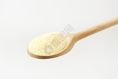 木勺子硬质小麦粗面粉勺子粗粮地面食物硬粒背景