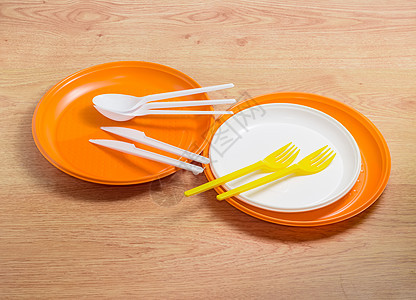 橙色和白色可支配塑料板 勺子 叉子和kn图片