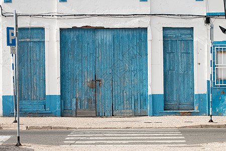旧蓝木门传统木头乡村房子城市入口蓝色旅行古董风化图片