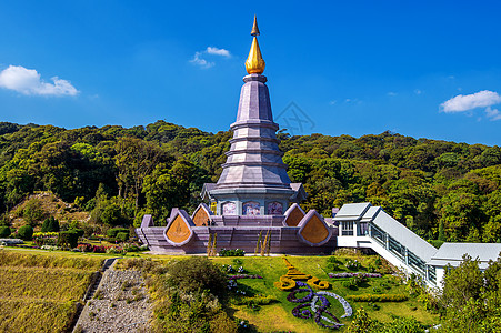 泰国清迈的国家公园地标塔佛教徒假期旅行建筑旅游文化佛塔游客诺帕寺庙图片