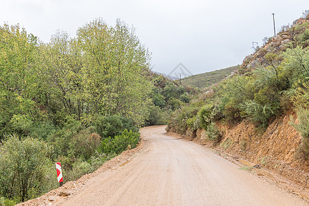 公路上的景观风景多云阴影泥路乡村图片