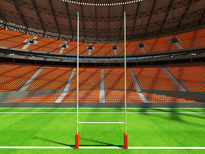 大型美丽现代橄榄球场 有橙色座椅和贵宾箱邮政草皮沥青游戏橙子转换玻璃竞赛惩罚盒子图片