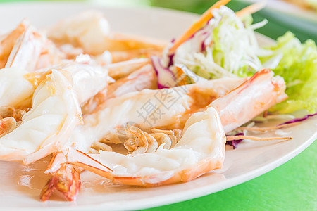 含酱汁的大虾烹饪午餐香料橙子海鲜贝类餐厅食物盘子小龙虾图片