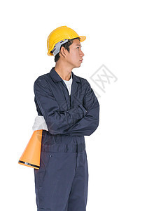 黄头戴黄头盔的青年工人拿着扩音器喇叭成人安全帽员工服务工作室技术员白色男人黄色图片