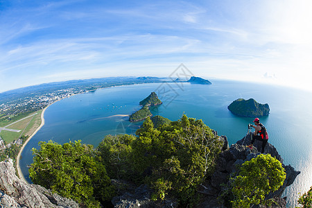 普拉丘普湾情调旅游山脉男人天空海滩支撑太阳海洋旅行图片