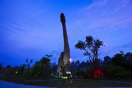 泰国的恐龙公园情感寺庙游客力量景点绿色雕像身体热带公园图片