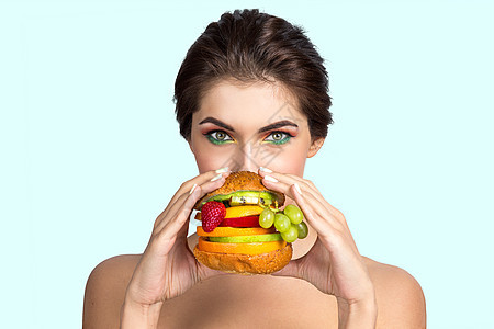 妇女吃蔬菜汉堡包饮食乐趣营养女孩成人女性包子女士图片