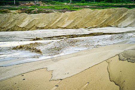 采掘沙土 带水的沙坑疏浚建造矿物环境旅游建筑荒野地球挖掘技术图片