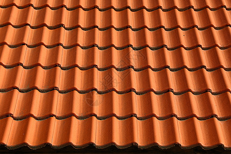 红棕色陶瓷屋顶瓦片图案背景橙子制品建筑红色瓷砖材料房子建筑学图片
