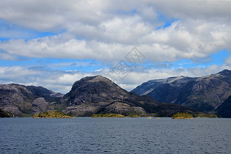 智利Bernardo OHiggins国家公园中与山岳交汇的美丽草原拉丁冰川全景灯塔旅行风景土地公园国家牧场图片