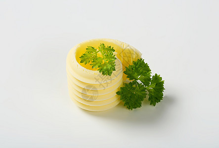 黄油卷曲形和正方螺旋香菜食物卷曲黄油食品奶制品图片