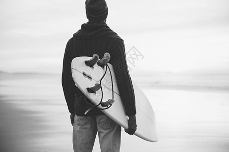 冲浪是一种生活方式海岸爱好天空男性男人成人冲浪者木板海洋日落图片