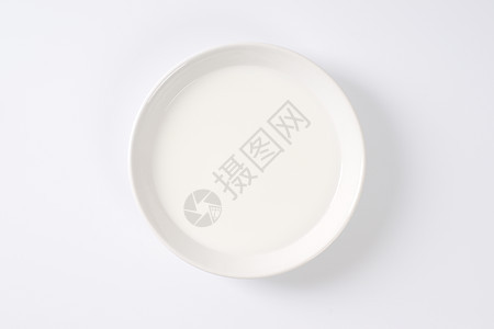 鲜奶杯牛奶液体灰白色食物背景白色盘子奶制品营养饮料背景图片