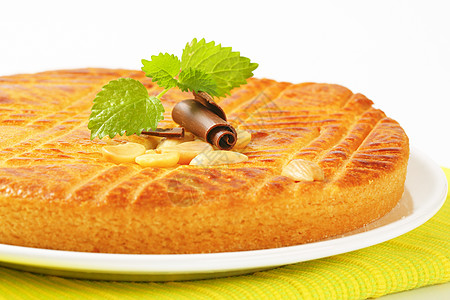 荷兰奶油蛋糕鸡蛋花巧克力面包食物圆形杏仁盘子甜点图片