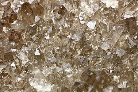 封闭的石英矿晶体团宝石矿物学棕色材料岩石矿物编队科学水晶边缘图片
