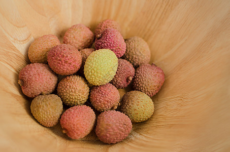 碗里有干菜水果粉色白色食物情调红色团体荔枝热带异国图片
