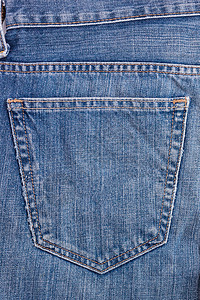 牛仔蓝牛仔裤口袋纹理是经典的靛蓝时尚材料国家棉布帆布装饰按钮蓝色衣服织物风格图片