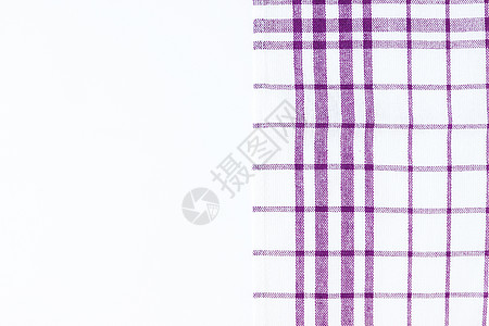 洋红色格纹布厨房毛巾是紫色织物桌子格子编织检查桌布野餐棉布材料背景图片