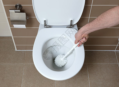 洗手间中的白色厕所碗陶瓷卫生间优雅卫生棕色座位制品浴室图片
