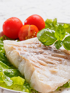 烤熟的鳕鱼加鱼和樱桃西红柿午餐营养餐厅食物烹饪油炸食谱饮食青菜美食图片