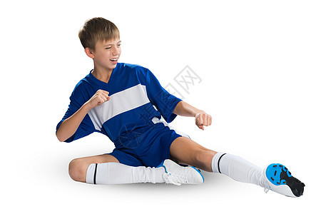 青年足球运动员乐趣男生玩家运动蓝色童年孩子诡计训练冠军图片