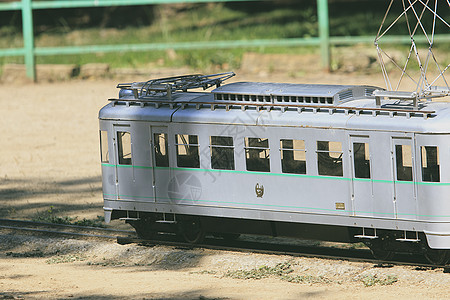 西班牙实际火车的微型复制列车 西班牙铁路旅行汽船历史性水平木板灰色机车公园燃料图片