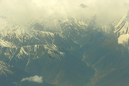 山顶有雪顶峰天空飞机挑战沙漠高山登山蓝色首脑土地图片