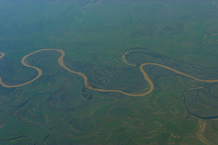 河流的顶面视图地标出口森林异国飞机盆地情调溪流眼睛观光图片