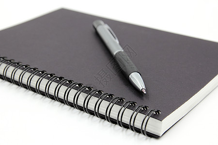 白背景上孤立笔记本和笔商业白色笔记记事本工作日记软垫文档教育办公室图片