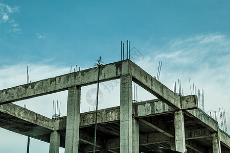 建筑建设中使用的建筑结构图蓝色地面水泥金属起重机商业工业建筑学力量框架图片