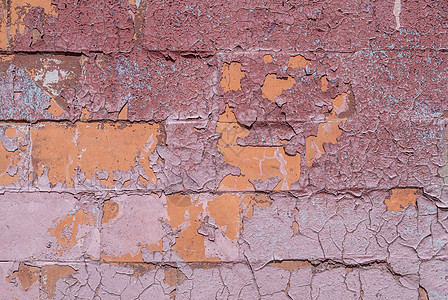 旧混凝土墙上的粉刷 纹理背景粉色橙子建筑褐色栗色风化水泥棕褐色灰色石头图片