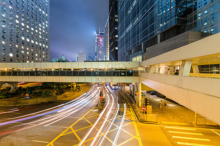 香港夜间交通量商业蓝色街道天空驾驶天际城市摩天大楼运输建筑学图片