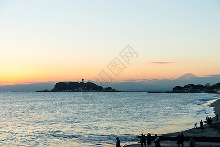 日本光南日落场景海洋太阳地平线海滩海浪旅游假期天空城市图片