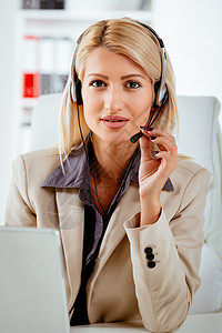 工作的女人呼叫操作员工作职业经理女性办公室耳机服务上班族技术专业背景