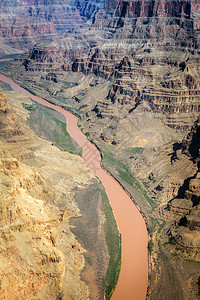 大峡谷的空中视图侵蚀砂岩红色绿色沙漠天线岩石峡谷橙子石头图片