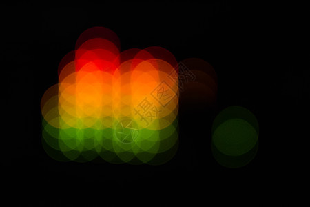 模糊的均衡器条抽象彩点光谱波浪圆圈彩虹频率橙子绿色背景运动红色图片